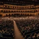 Stage view of the DealBook Summit 2025 with speakers seated in front of a live audience at Jazz at Lincoln Center.