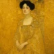 Elegant woman in gold-infused gown inspired by Gustav Klimt’s Golden Phase, surrounded by Art Nouveau patterns and shimmering gold textures